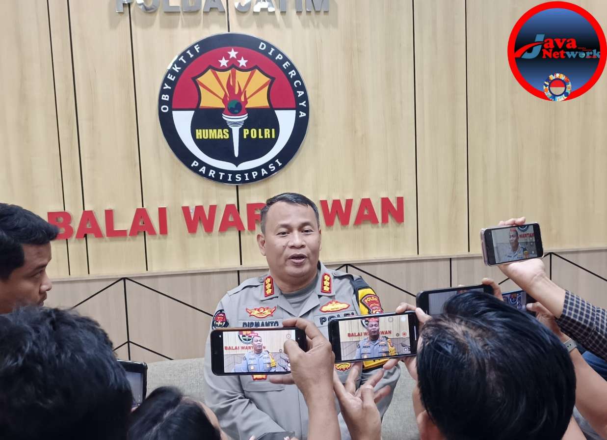 Kabid Humas Polda Jatim Kombes Pol Dirmanto Saat Dikonfirmasi Awak Media 