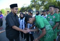 Bupati Sumenep Achmad Fauzi Wongsojudo Saat Memberikan Program Asuransi Ketenagakerjaan Kepada Atlet Yang Akan Berlaga di Ajang Porprov Jatim 2025, Kamis (05/06/2025)