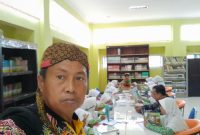 Pustakawan Ahli Muda Drs. Syaiful Bahri 