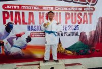 Fatur Rahman, siswa kelas V, yang sukses meraih Juara I Komite +35 Kg SD Putra Kelas 4–6 pada ajang bergengsi Jatim Martial Arts Championship Piala Ketua Umum KONI Pusat, yang berlangsung di GOR Ken Arok, Malang