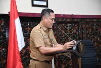 Kepala Bapenda Sumenep Faruk Hanafi, S.Sos.,M.Si. Saat Menyampaikan Laporan di Acara HLM Di Ruang Adirasa Pemkab Sumenep Senin (20/10/2025)