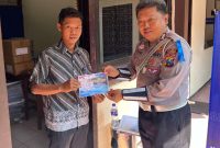 Polantas Polres Sumenep Bersama Salah Warga Desa Aeng Merah Kecamatan Batuputih Romli