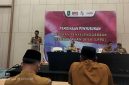 Asisten 1 Setdakab Sumenep Ir. Didik Wahyudi, M.Si di Acara Pembinaan Penyusunan Laporan Penyelenggaraan Pemerintahan Desa (LPPD) di Aula Hotel Mizye, Senin (18/05/2026).